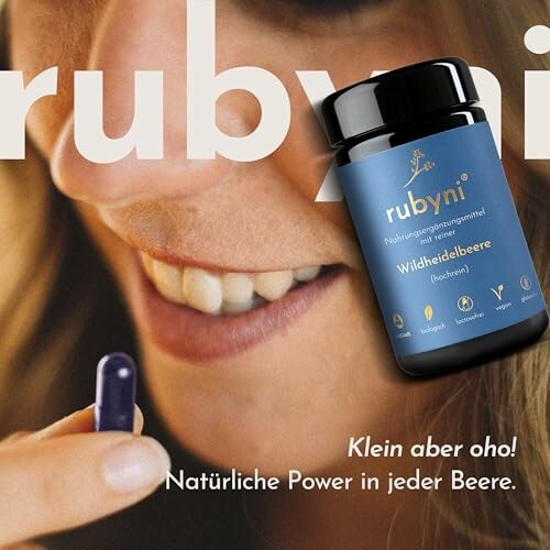 Frau hält eine Tablette neben Rubyni Nahrungsergänzungsmittel.